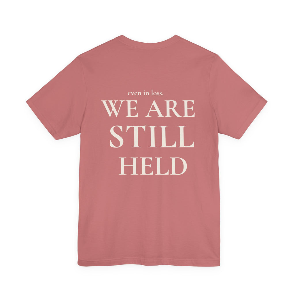 We Are Still Held Tee | Heaven Held Signature Shirt