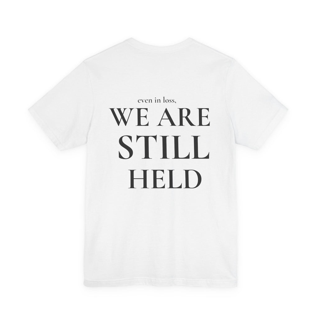We Are Still Held Tee | Heaven Held Signature Shirt